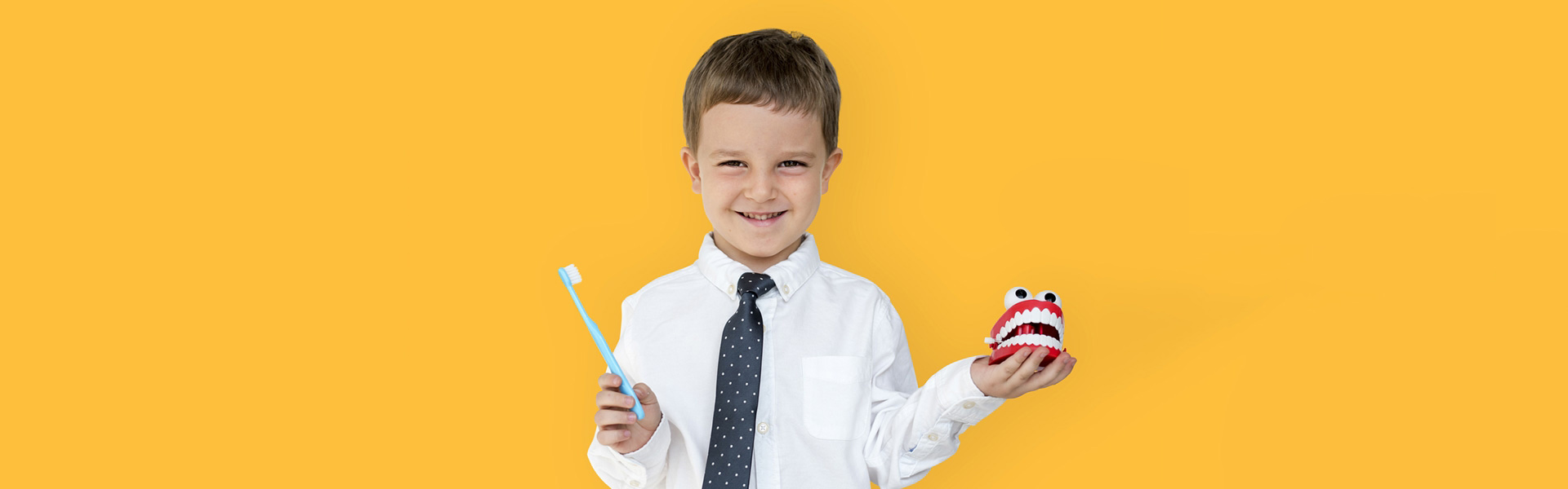 Young boy learning proper brushing during kids’ dental care in Cambridge