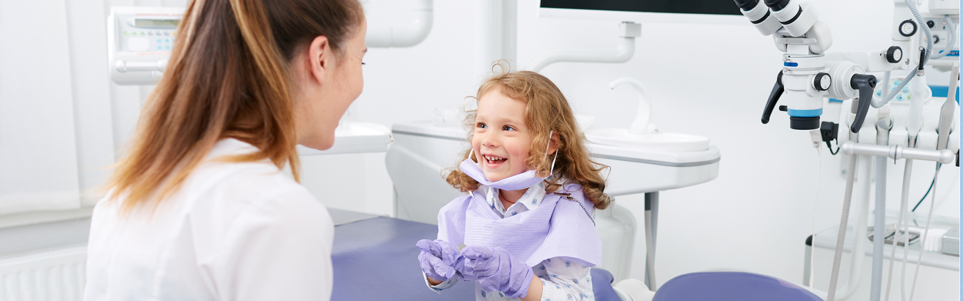Child smiling during pediatric dental care appointment in Cambridge