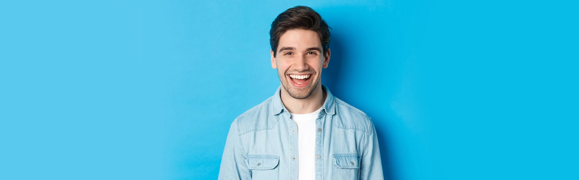 Smiling man after teeth whitening treatment in Cambridge